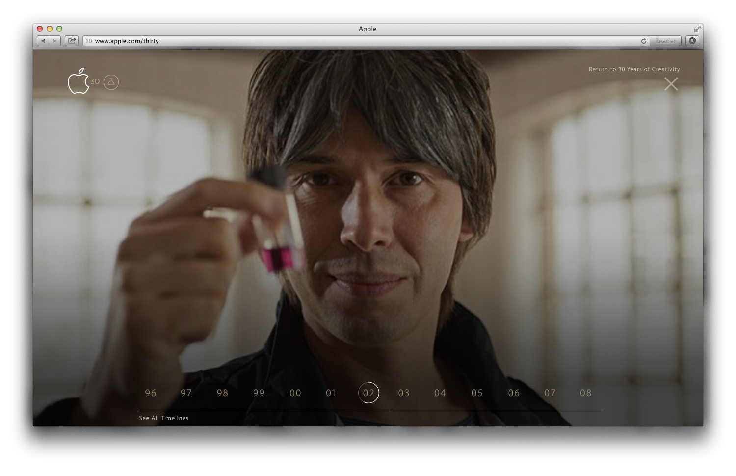 A scientist holding a vial in a film still from the experience